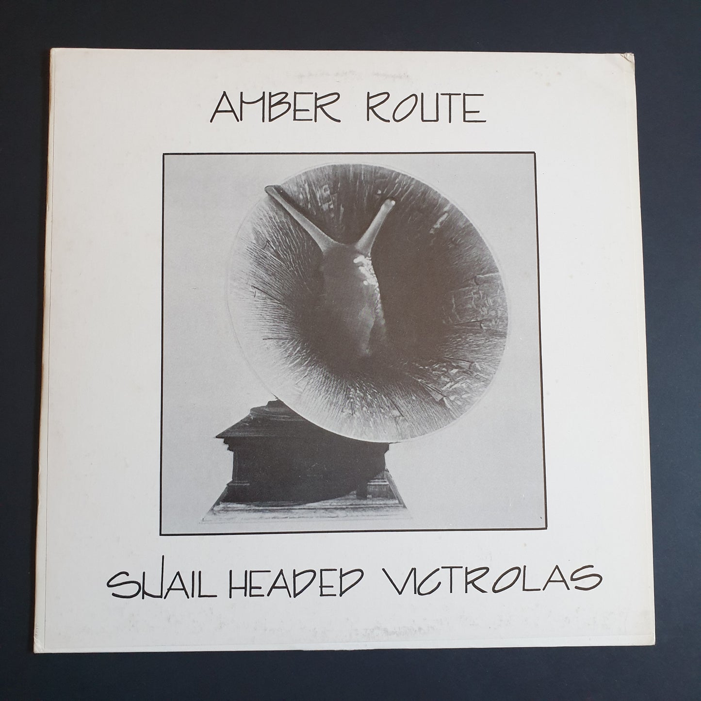 AMBER ROUTE - Snail Headed Victrolas