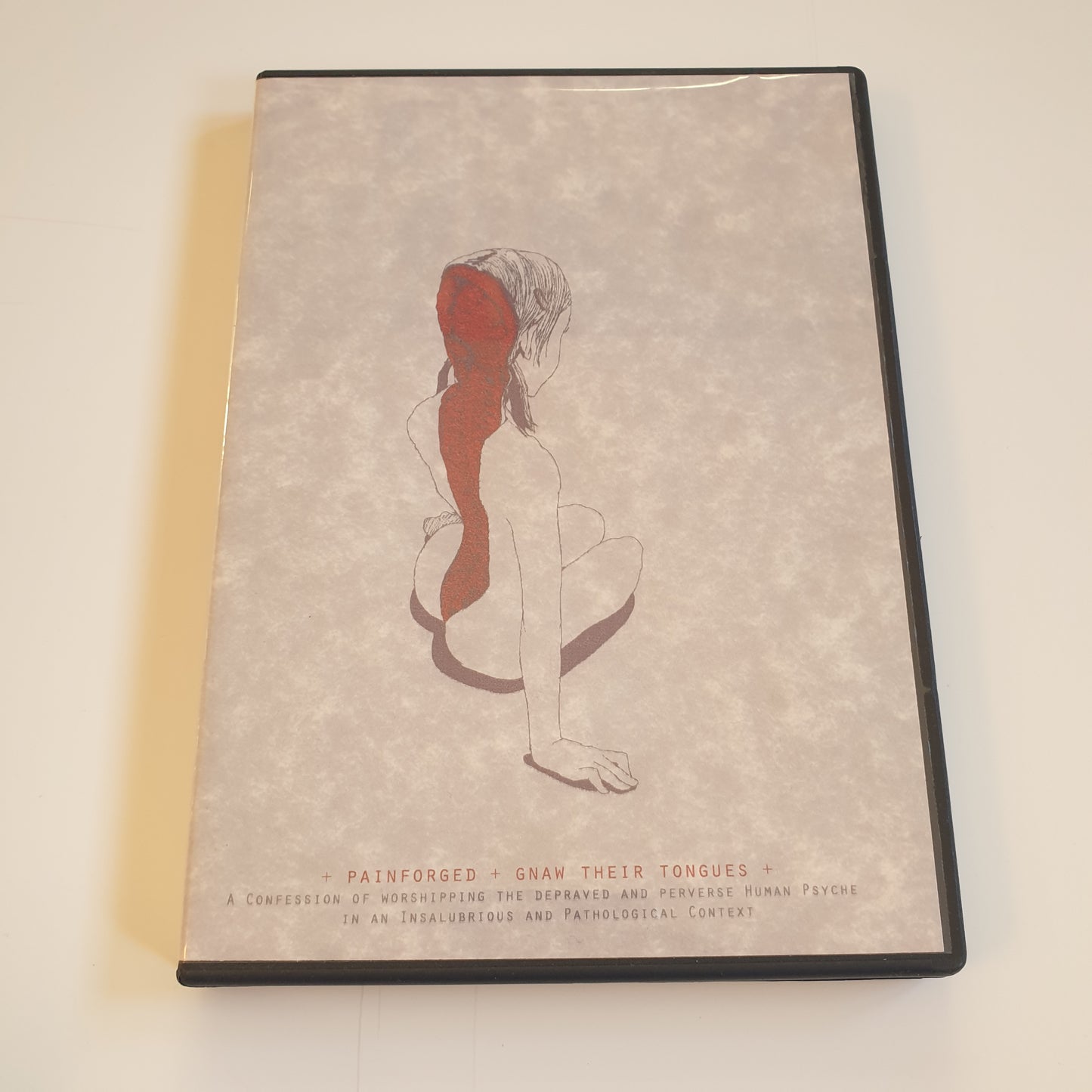 GNAW THEIR TONGUES / PAINFORGED - A Confession Of Worshipping The Depraved...