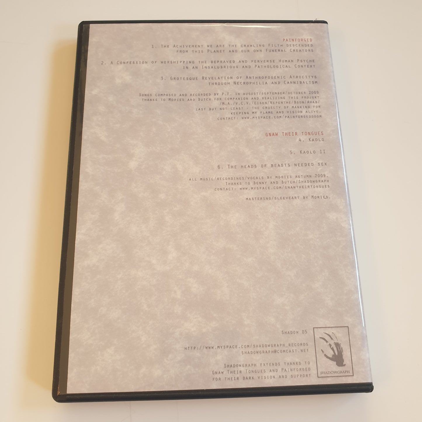 GNAW THEIR TONGUES / PAINFORGED - A Confession Of Worshipping The Depraved...